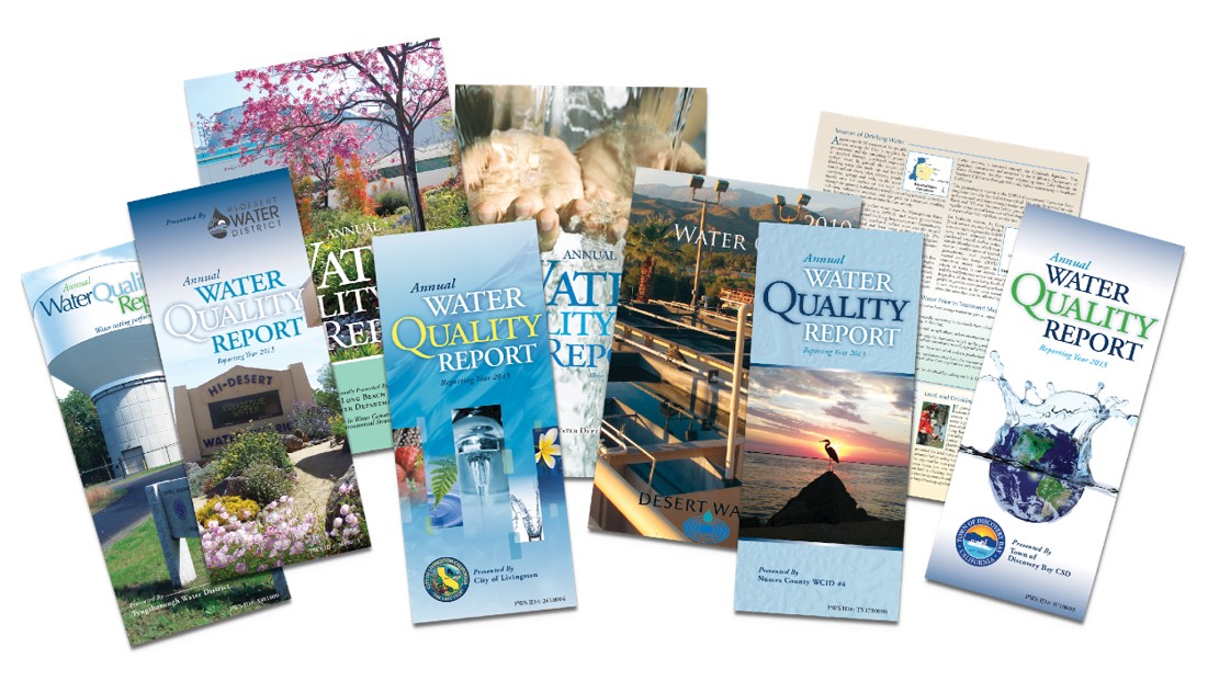 REPORTS (1) Photo of an hour glass with teal grains running about half way through in front of a monthly calendar.